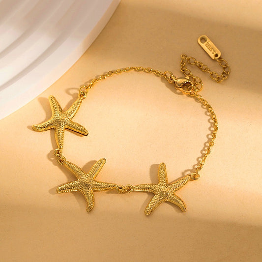 Pulsera triple estrella