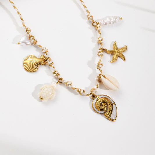 Collar hilo blanco con caracol blanco