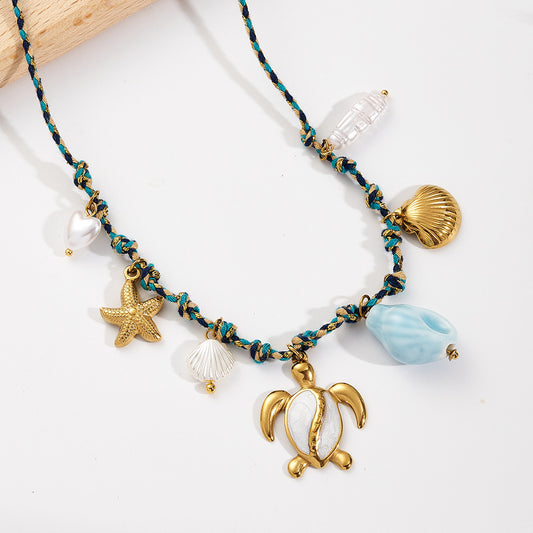 Collar hilo azul tortuguita