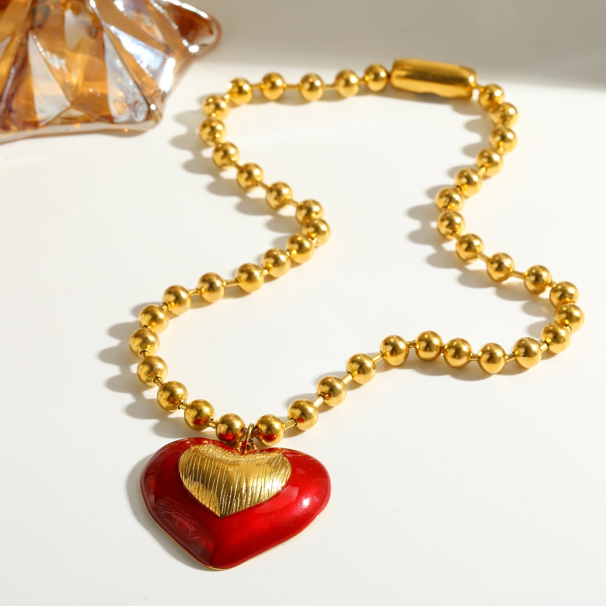 Collar corazón con dorado