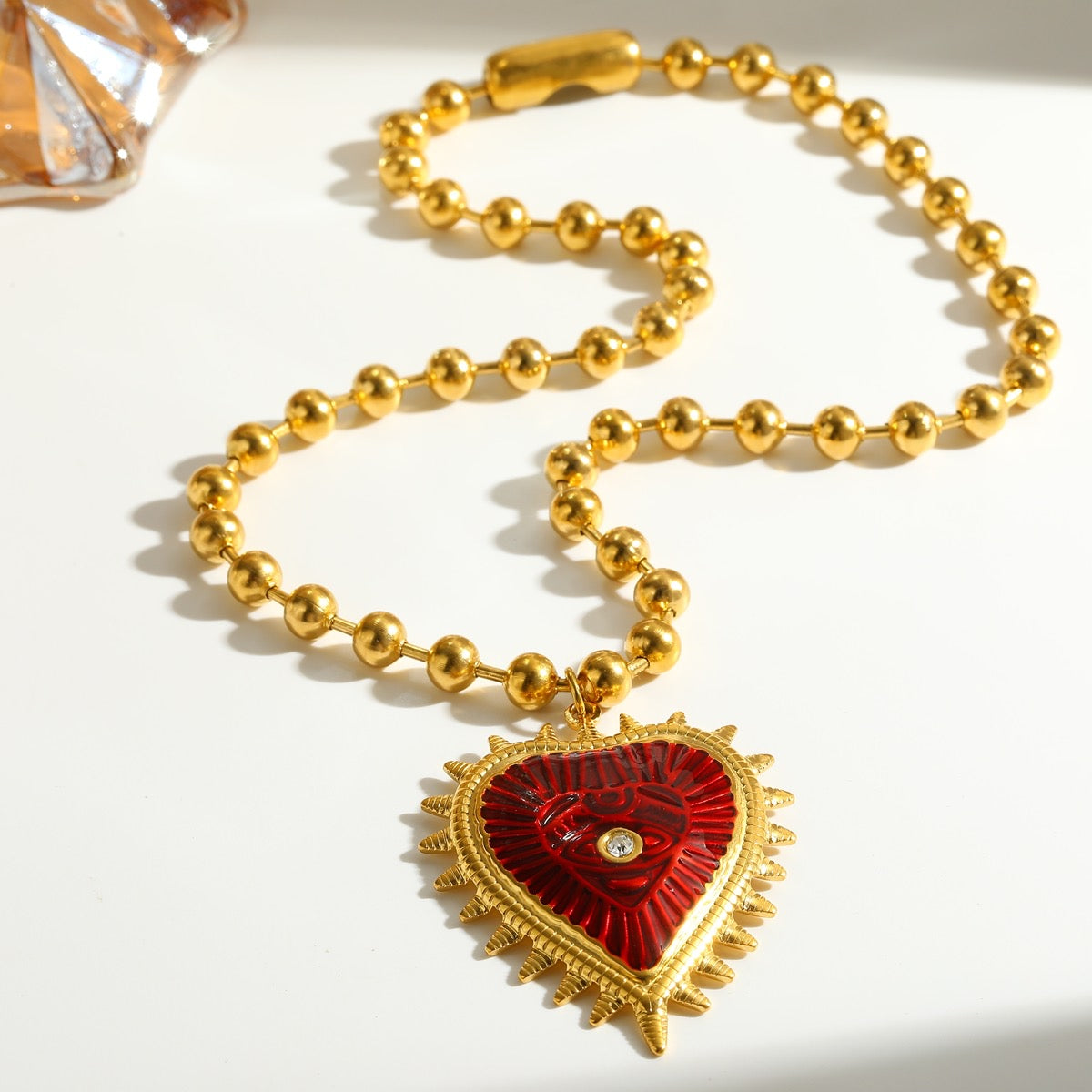 Collar chuncky de balines corazón sagrado