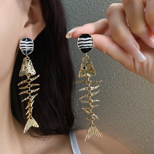 Aretes esqueleto con zebra dorado