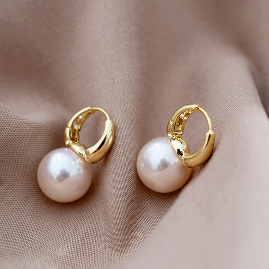 Aretes con perla estilo Huggies
