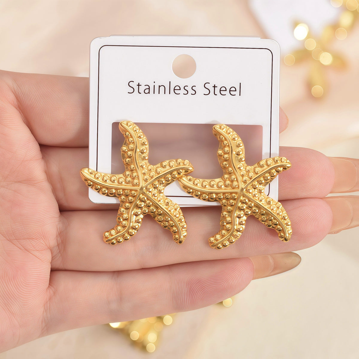Aretes estrella de mar con textura