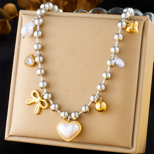 Collar bitono corazón aperlado