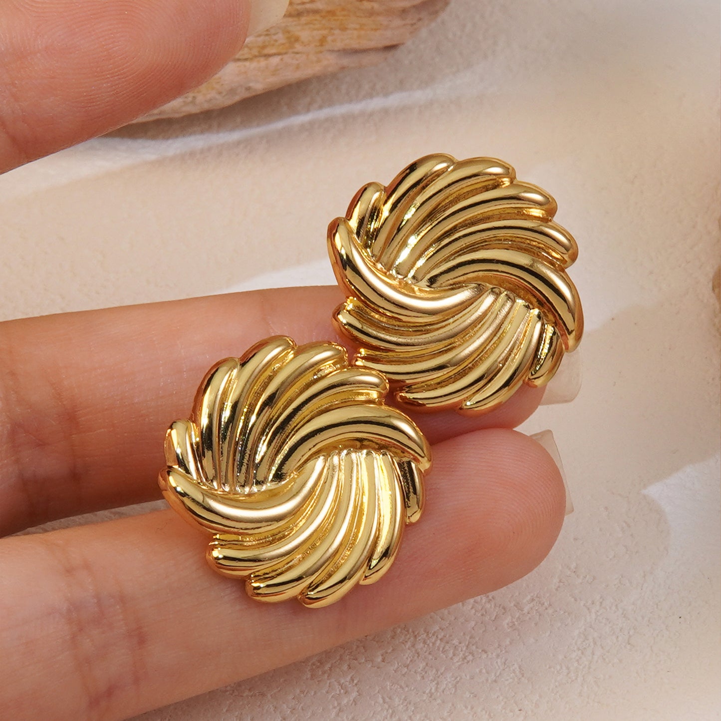 Aretes torbellino